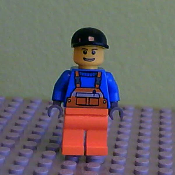 Overalls with Safety Stripe Orange, Orange Legs, Black Short Bill Cap, Brown Eyebrows and Open Smile
