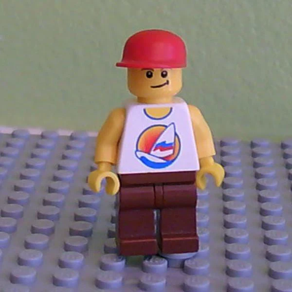 Surfboard on Ocean - Reddish Brown Legs, Red Cap