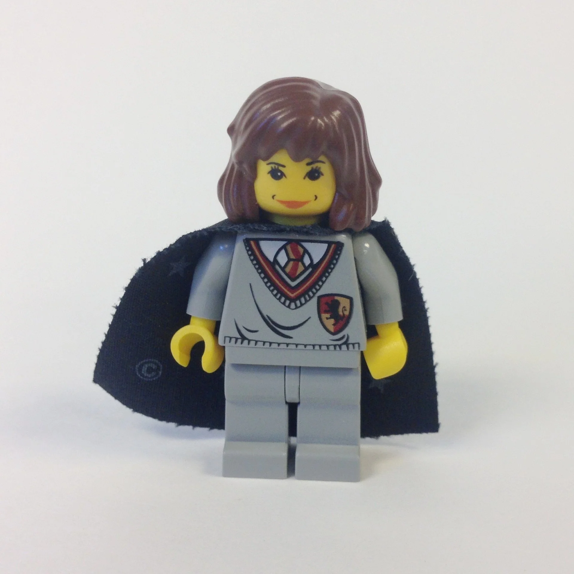 Hermione, Gryffindor Shield Torso, Light Gray Legs, Black Cape with Stars