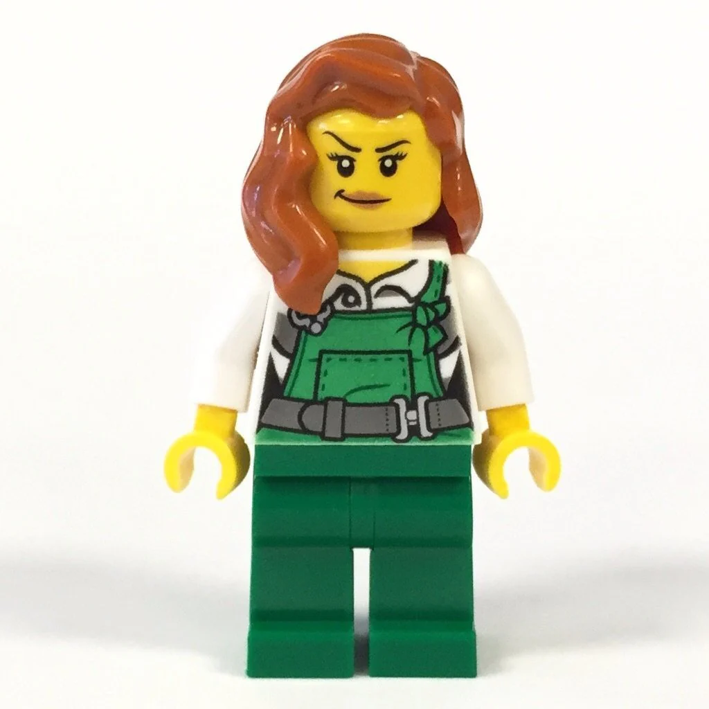 Police - City Bandit Female with Green Overalls, Dark Orange Female Hair over Shoulder, Peach Lips Smirk
