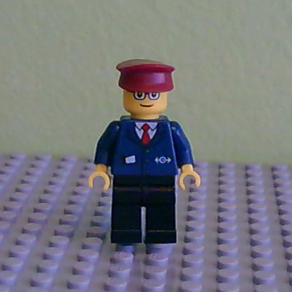 Dark Blue Suit with Train Logo, Black Legs, Black Hat