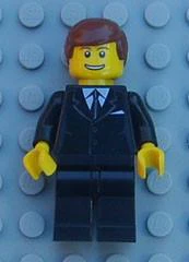 Suit Black, Reddish Brown Male Hair, Thin Grin with Teeth