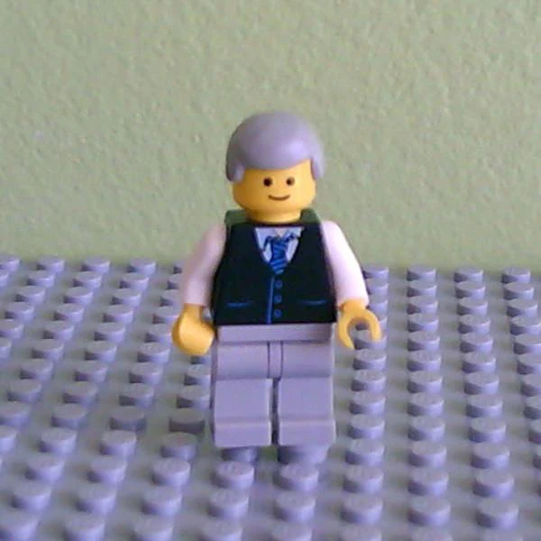 Black Vest with Blue Striped Tie, Light Bluish Gray Legs, White Arms, Light Bluish Gray Male Hair, Smile